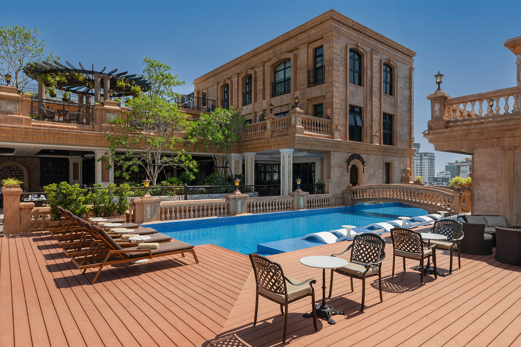Anik Palace Hotel pool and architecture, luxury hotel amenities photography in Phnom Penh.